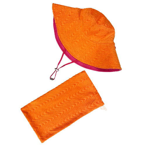 An orange textured sun hat with a pink inside and a chin strap, alongside a matching orange textured pouch. 