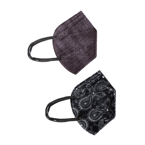 A collection of five face masks laid out on a light gray background. There are two distinct designs: three masks feature a paisley pattern with a black base and white intricate designs, while two masks are in a solid black shade.