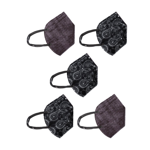 A collection of five face masks laid out on a light gray background. There are two distinct designs: three masks feature a paisley pattern with a black base and white intricate designs, while two masks are in a solid black shade.