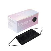A box of 30 black disposable face masks with the brand name ‘barrière’ printed on it. The box is pink and white with a circular cut-out through which the black masks inside can be seen. Below the box, there is one black face mask displayed outside of the packaging.