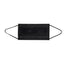 A single black face mask with ear loops lying on a white surface. The mask is designed for personal protection.