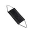 A single black face mask with ear loops lying on a white surface. The mask is designed for personal protection.