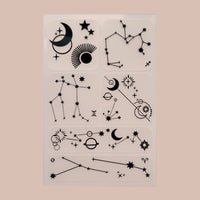 Six ‘Daily Defense’ patches featuring designs of moons, stars, and other solar elements.