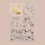  A collection of patches with celestial and astrological designs. The tattoos feature various symbols such as the sun, moon, stars, planets, and zodiac constellations. The designs are intricate and use gold color, giving them an elegant appearance. The patches are arranged on a white background.