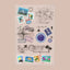 A collection of various travel-themed vitamin patches. These stickers feature different designs, including a diving club logo, a Route 66 sign, a compass rose with cardinal directions, an airplane route map, stamps with city names like Amsterdam and Paris, and tropical scenes with palm trees. The stickers represent a variety of travel-related activities and destinations. This image is on a beige background. 