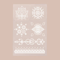 6 patches of white ‘Daily Defense’ patches, each with unique designs, on a beige background.